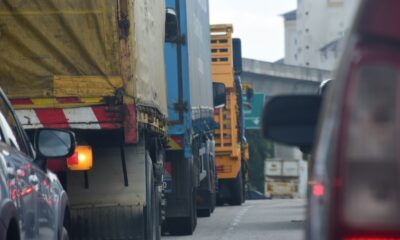 a couple of trucks that are sitting in the street