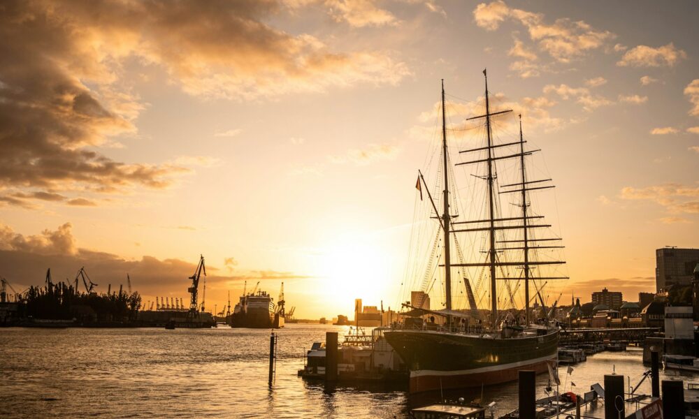 sailboat in dock during golden hour