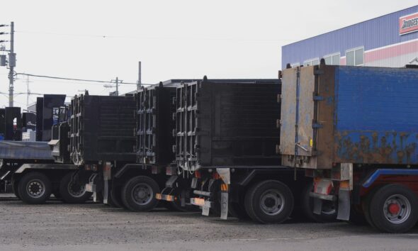 blue and brown freight truck on road during daytime