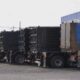 blue and brown freight truck on road during daytime