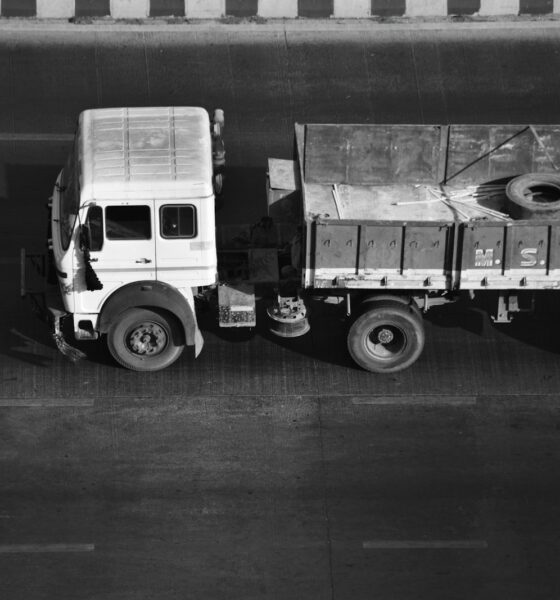 a black and white photo of a truck