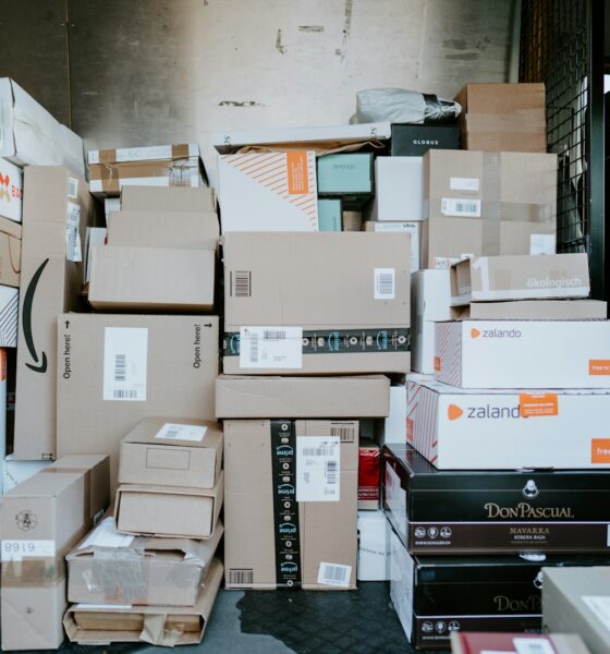 brown cardboard boxes on black plastic crate